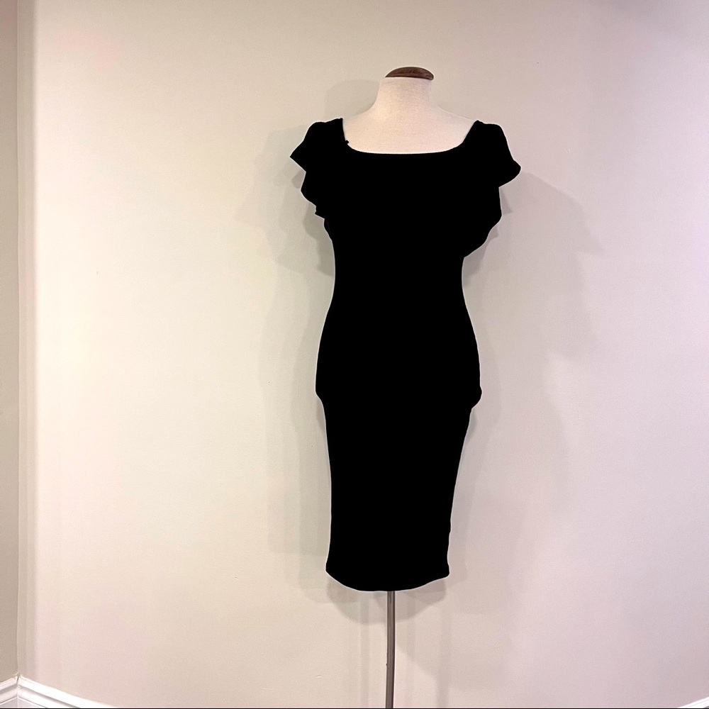 Fun and flirty black rib knit off the shoulder dress!!